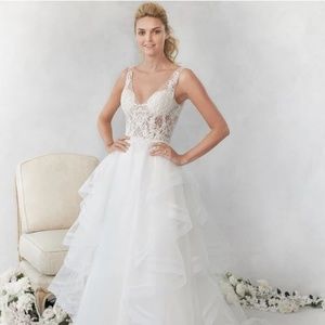 Elegant embroidered lace wedding gown with beading